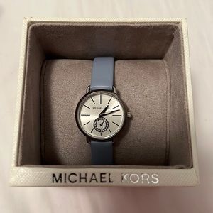 Almost New. Michael Kors Watch. Leather baby blue adjustable strap.